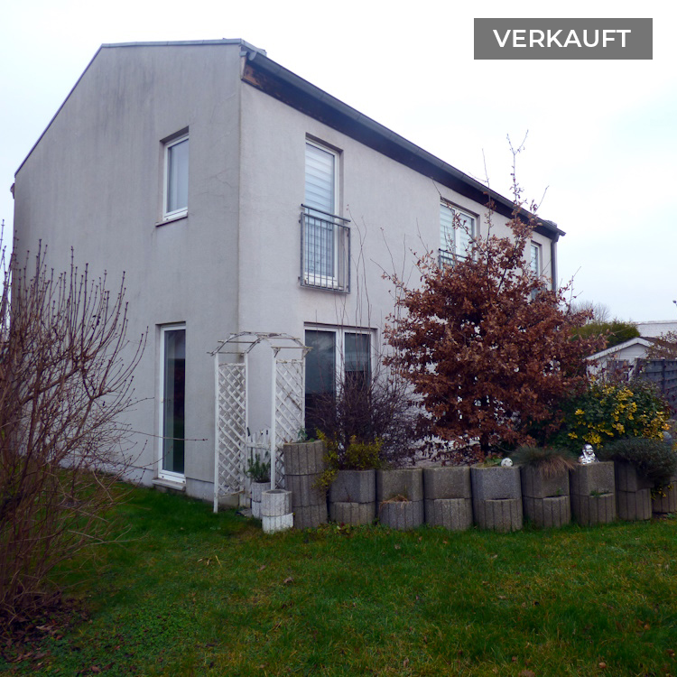 Modernes Haus mit Garten, verkauft.