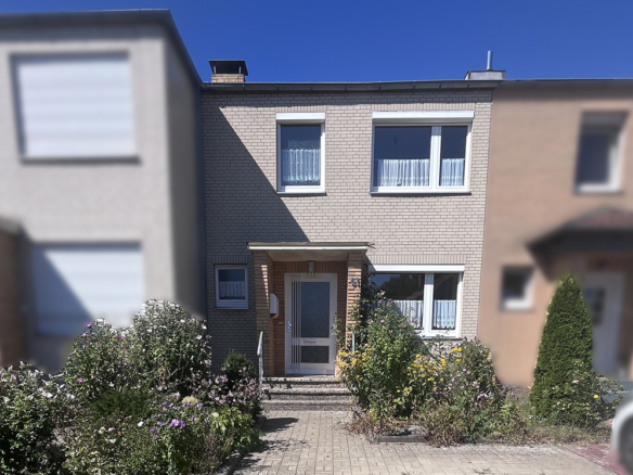 Reihenmittelhaus mit Verblender und überdachter Terrasse